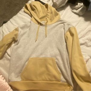 yellow and off-whitish american eagle hoodie. size s